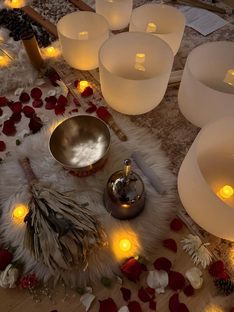 Crystal singing bowls prepared for a sound healing gathering